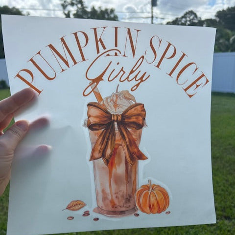 Paper with 'Pumpkin Spice Girly' design featuring a drink and pumpkin on grass.